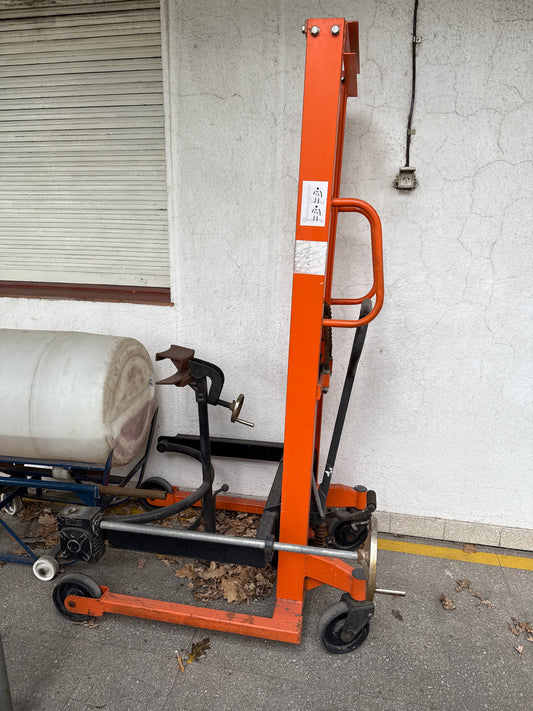 Volcador y transporte de tambores